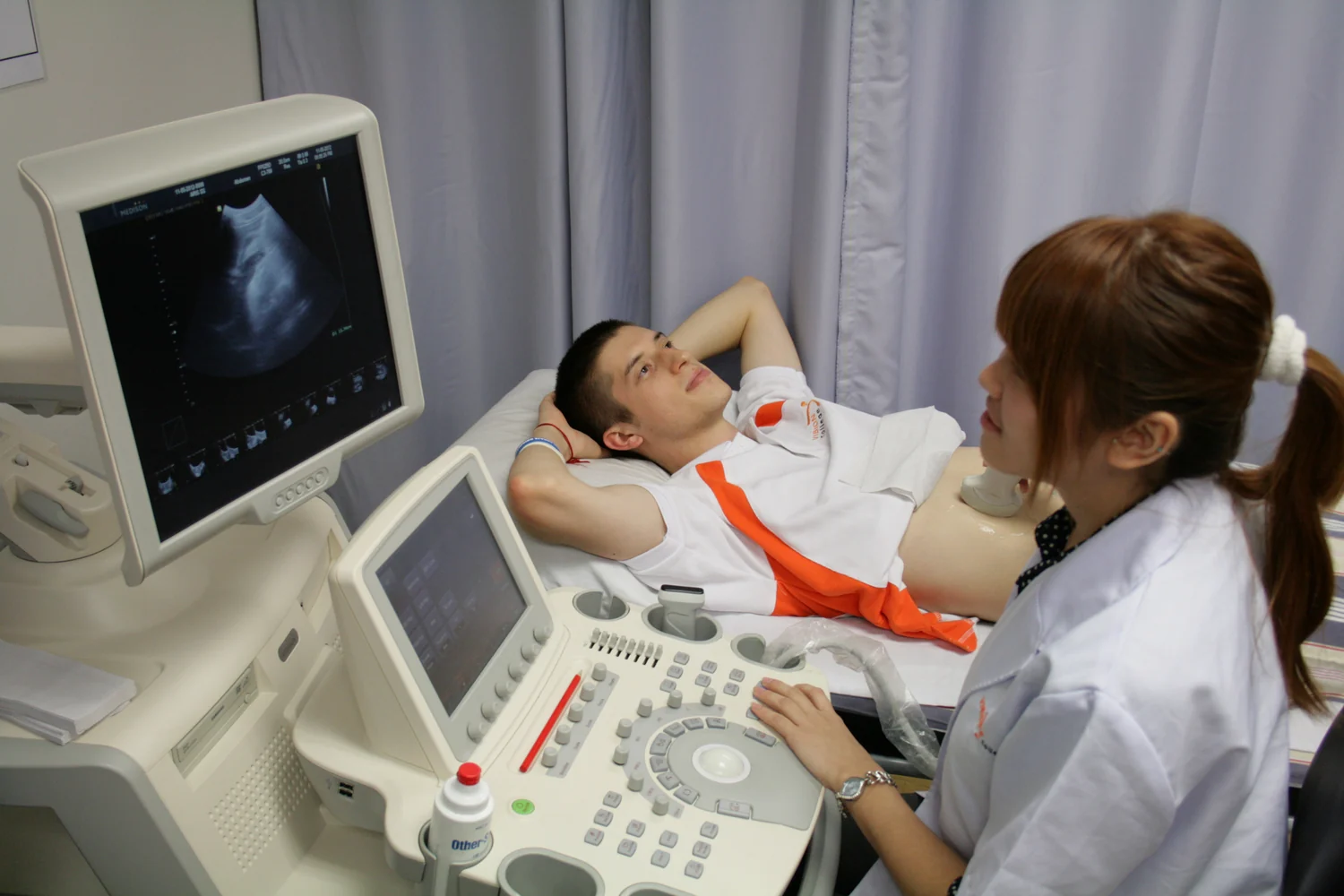 An ultrasound examination setup in a diagnostic clinic.