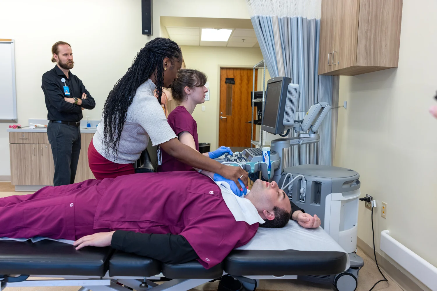 An ultrasound machine used for sonography teaching at a community college.