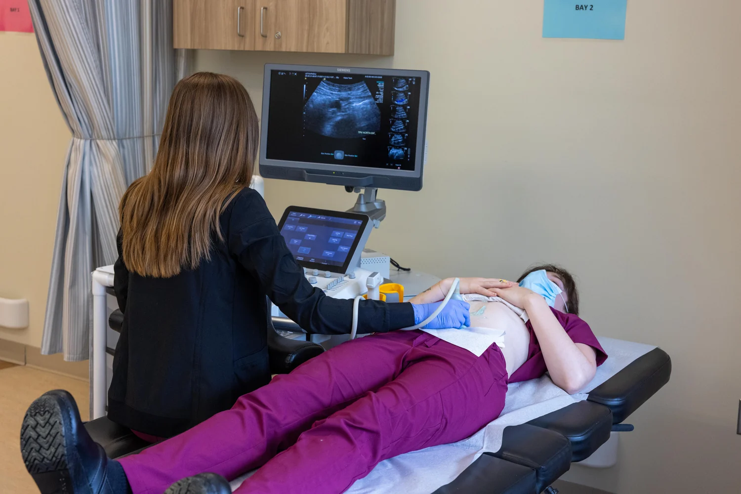 A sonography workstation photographed during an equipment donation.